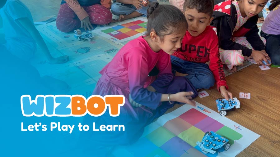 Wizbot Screen-free button based coding robot to teach FLN and CT