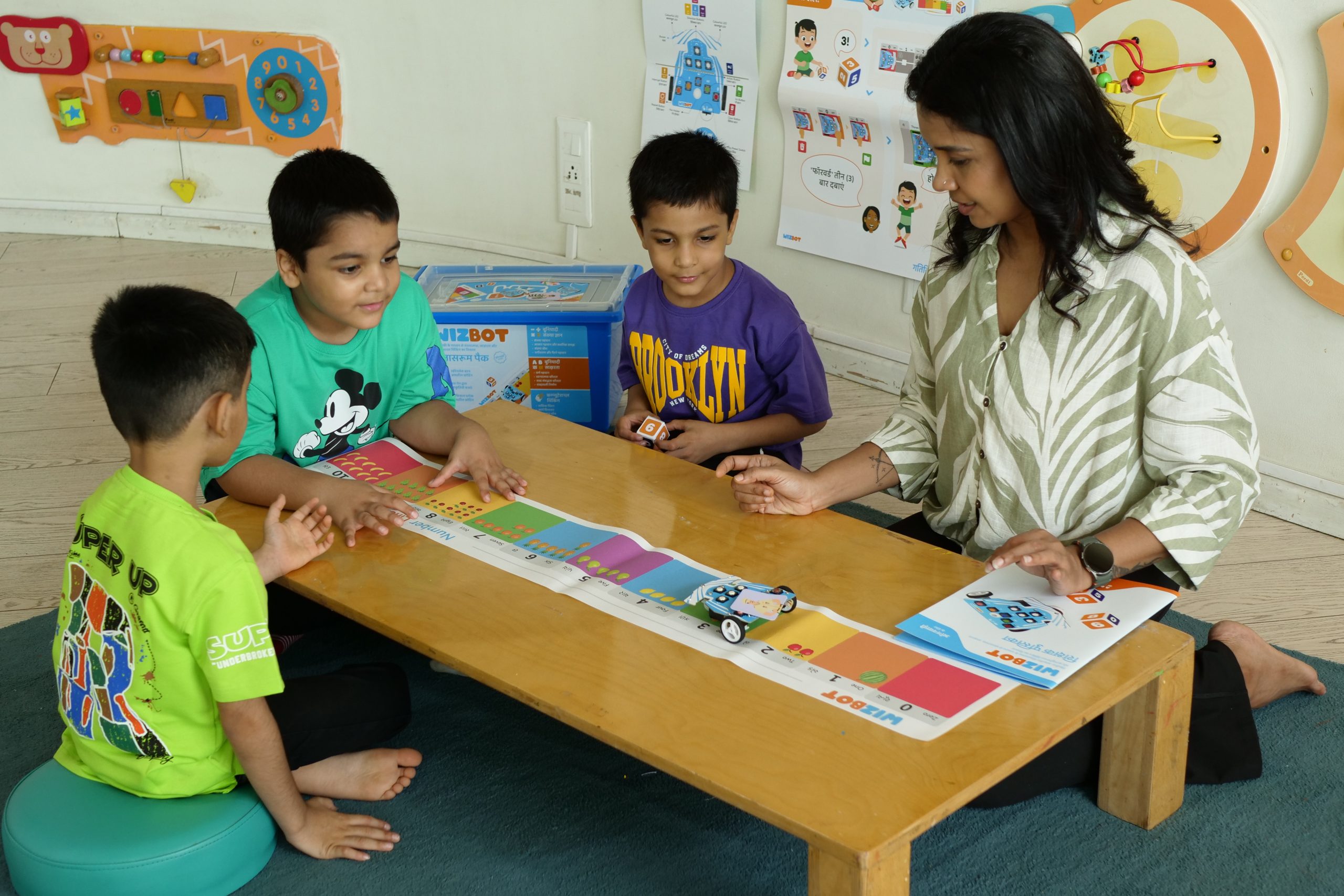 kids playing with number line arena